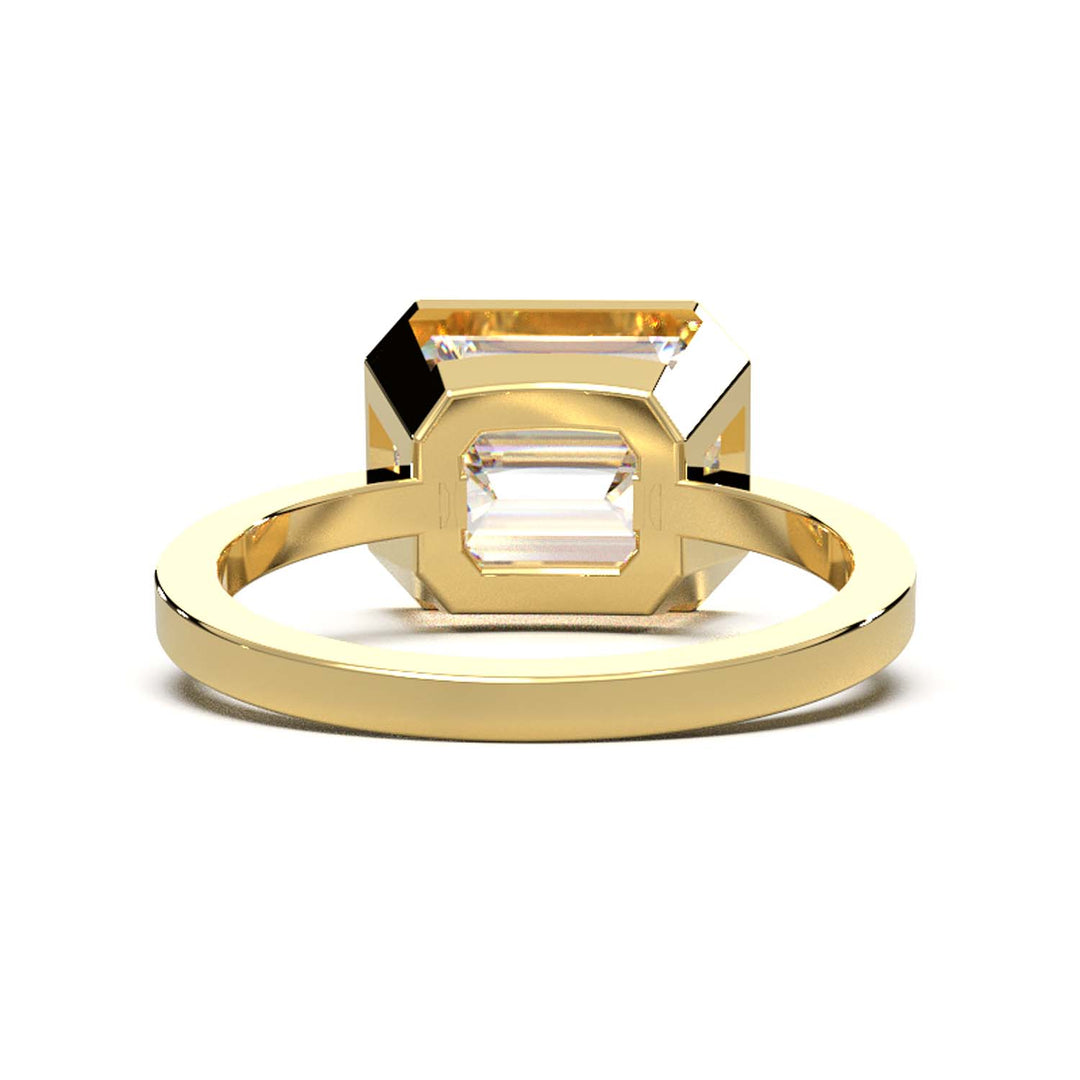 Exquisite 5.7-Carat Emerald-Cut Lab-Grown Diamond Engagement Ring in a Lustrous Bezel Setting
