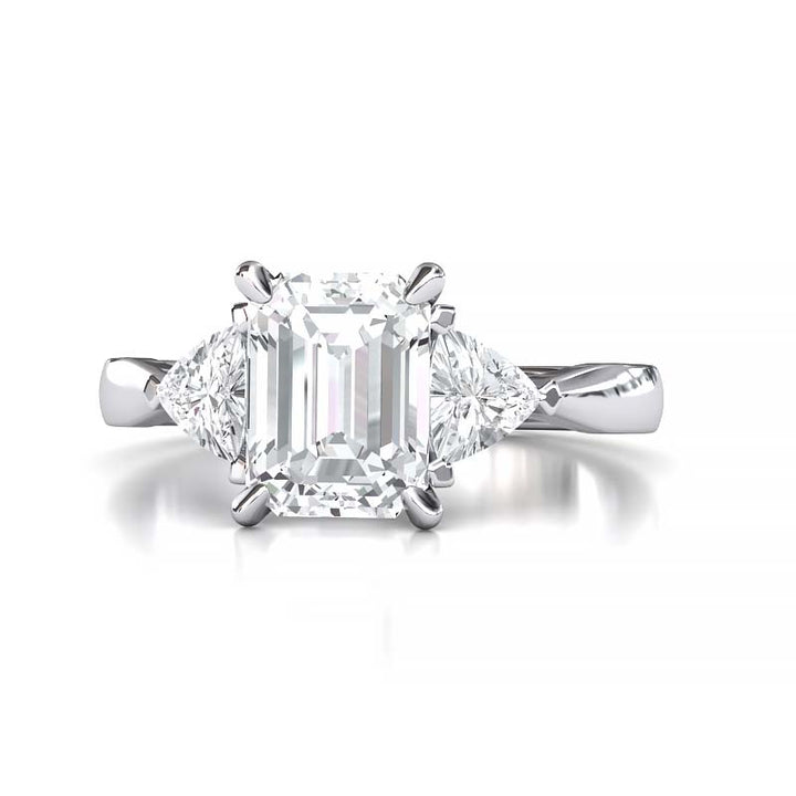 Exquisite 8x6mm Emerald-Cut Moissanite Three-Stone Ring with Tapered Band and Trapezoid Side Stones