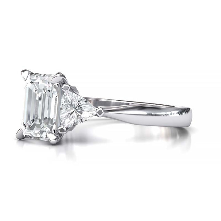 Exquisite 8x6mm Emerald-Cut Moissanite Three-Stone Ring with Tapered Band and Trapezoid Side Stones