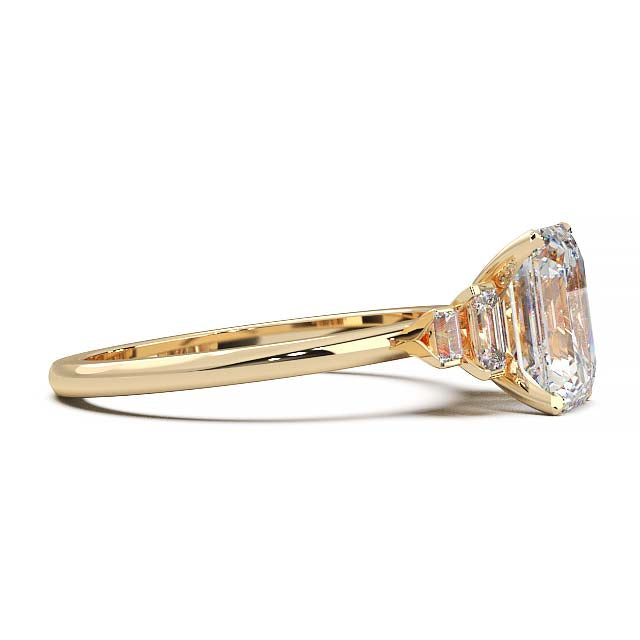 Exquisite 2.2ct Emerald-Cut Lab-Grown Yellow Diamond Engagement Ring with Flanking Baguettes Set in Lustrous Yellow Gold