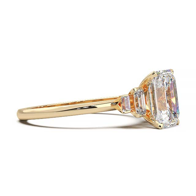 Exquisite 2.2ct Emerald-Cut Lab-Grown Yellow Diamond Engagement Ring with Flanking Baguettes Set in Lustrous Yellow Gold