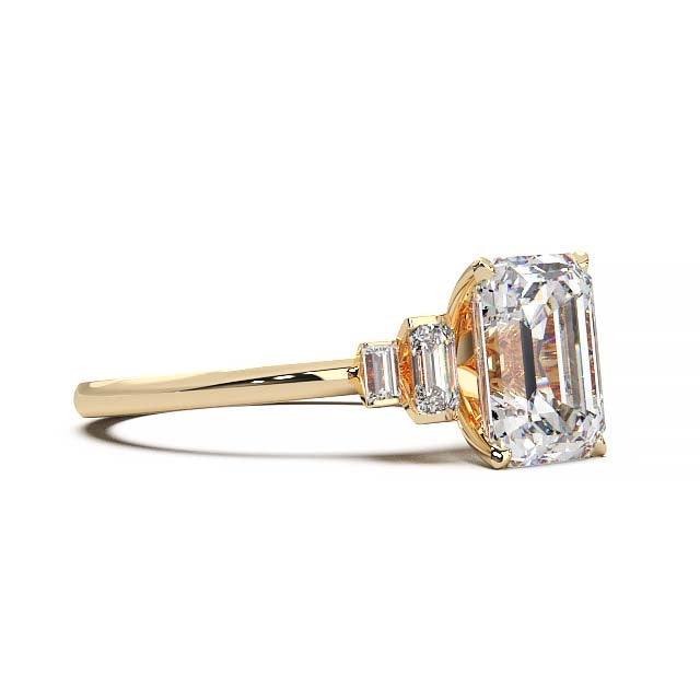 Exquisite 2.2ct Emerald-Cut Lab-Grown Yellow Diamond Engagement Ring with Flanking Baguettes Set in Lustrous Yellow Gold