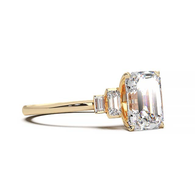 Exquisite 2.2ct Emerald-Cut Lab-Grown Yellow Diamond Engagement Ring with Flanking Baguettes Set in Lustrous Yellow Gold