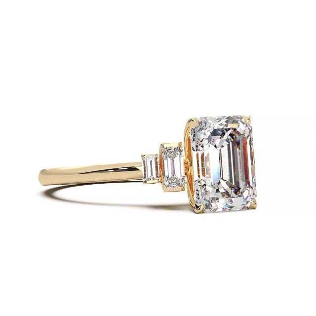 Exquisite 2.2ct Emerald-Cut Lab-Grown Yellow Diamond Engagement Ring with Flanking Baguettes Set in Lustrous Yellow Gold