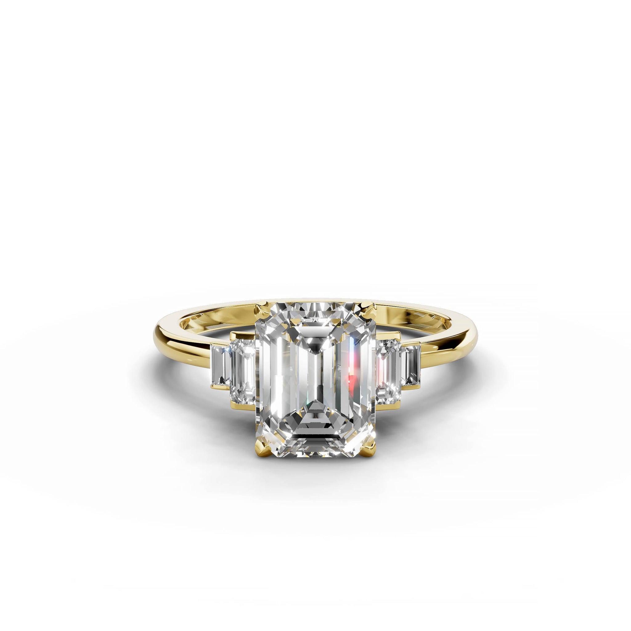 Emerald cut diamond five stone engagement ring in yellow gold.