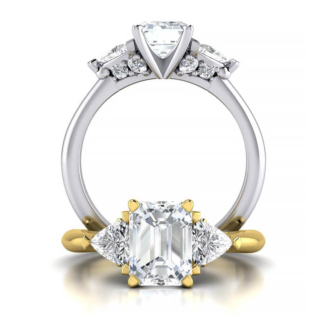 Emerald cut three stone engagement ring