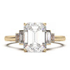 Exquisite 2.2ct Emerald-Cut Lab-Grown Yellow Diamond Engagement Ring with Flanking Baguettes Set in Lustrous Yellow Gold