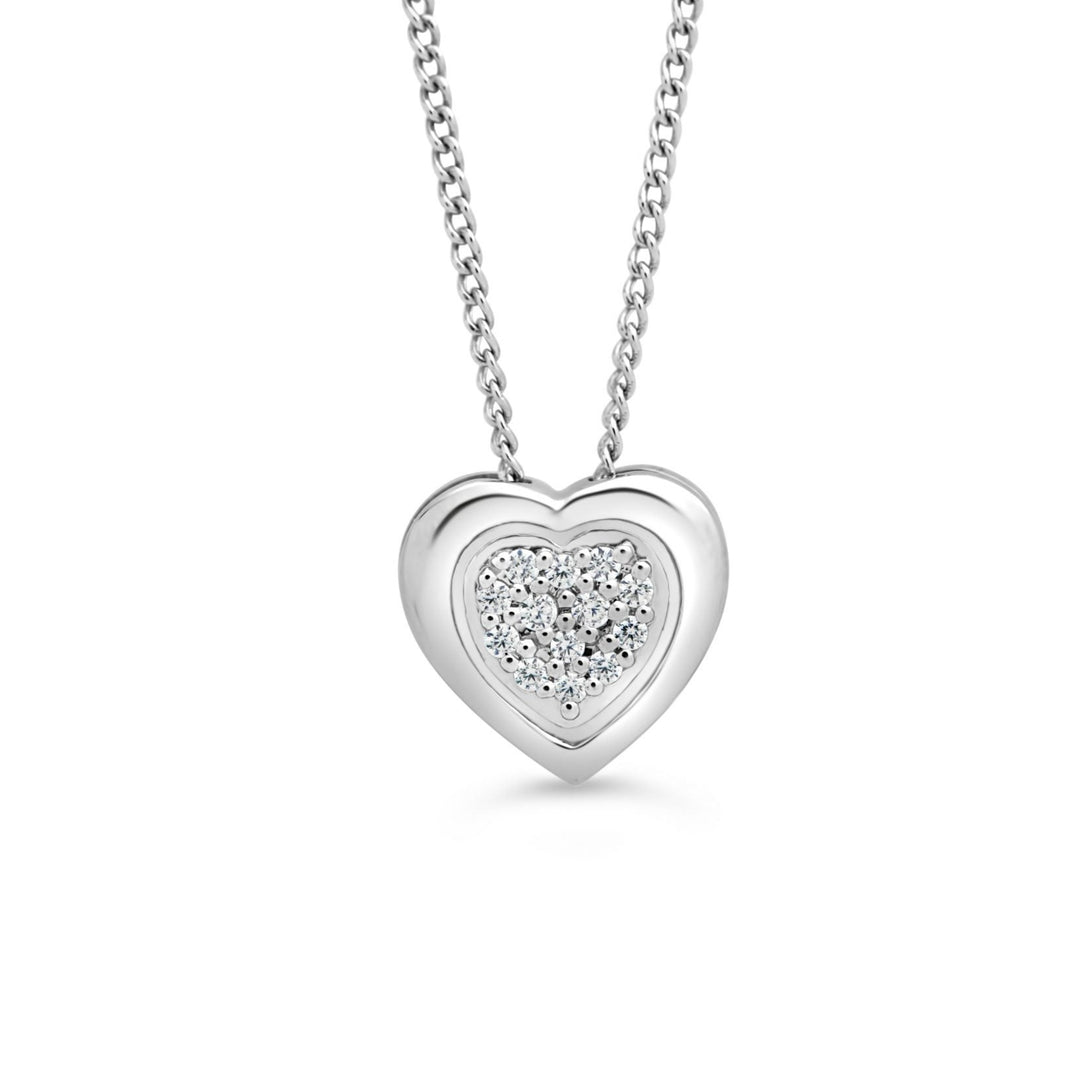 Elegant 10K white gold heart pendant filled with diamond pavé totaling 0.05 ct, displayed on a matching white gold chain, ideal for expressing love and devotion.