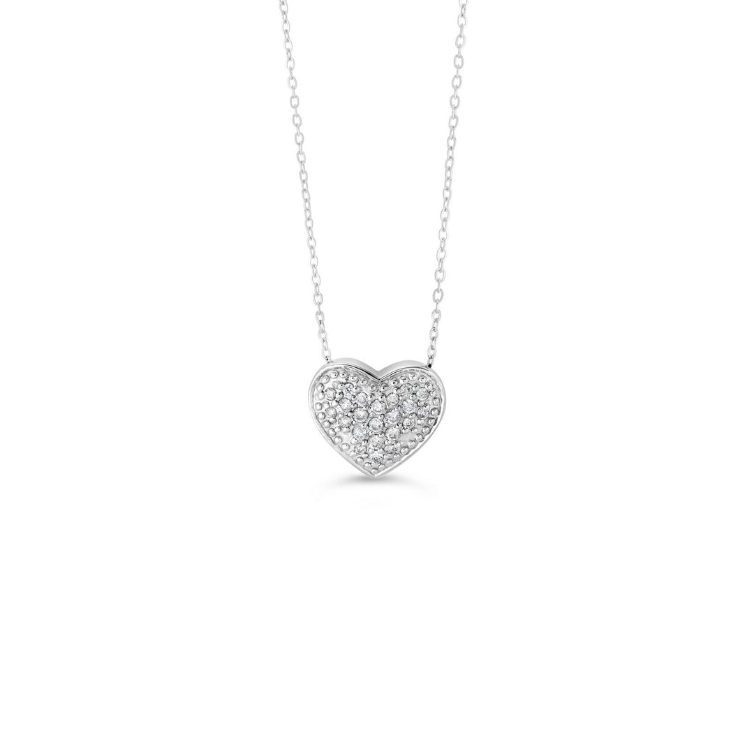 Elegant 10K white gold heart pendant densely packed with 0.10 ct of pavé diamonds, hanging gracefully on a matching chain, embodying romance and sophistication.