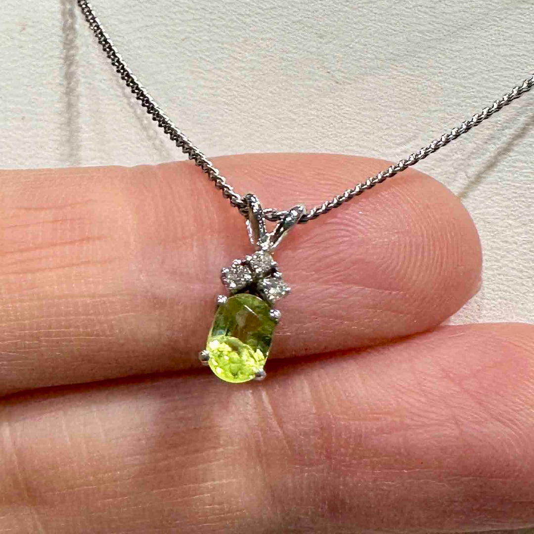 14K white gold pendant with genuine peridot and natural diamond on an 18" 14K white gold box chain, perfect for August birthstone gifts.
