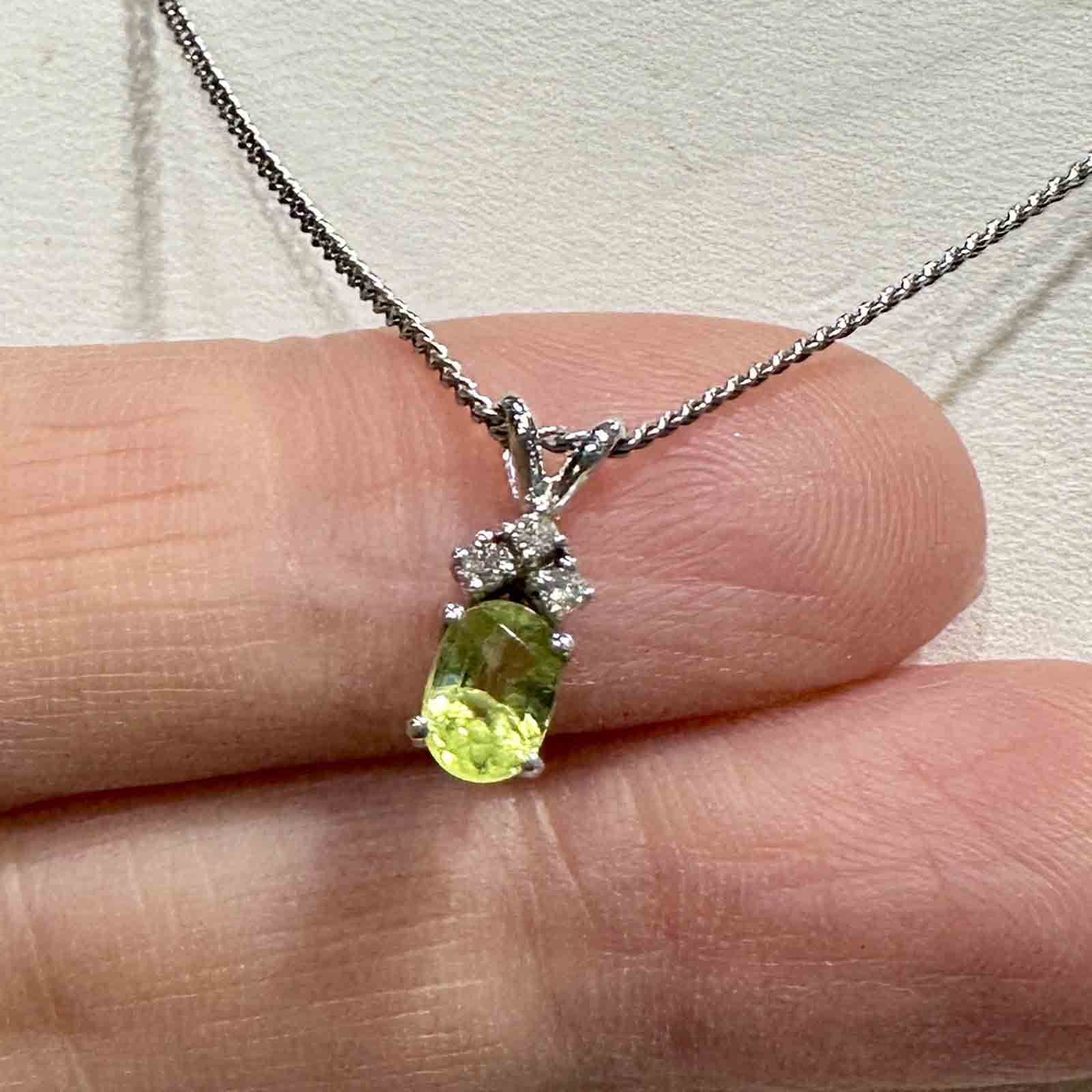 14K white gold pendant with genuine peridot and natural diamond on an 18" 14K white gold box chain, perfect for August birthstone gifts.