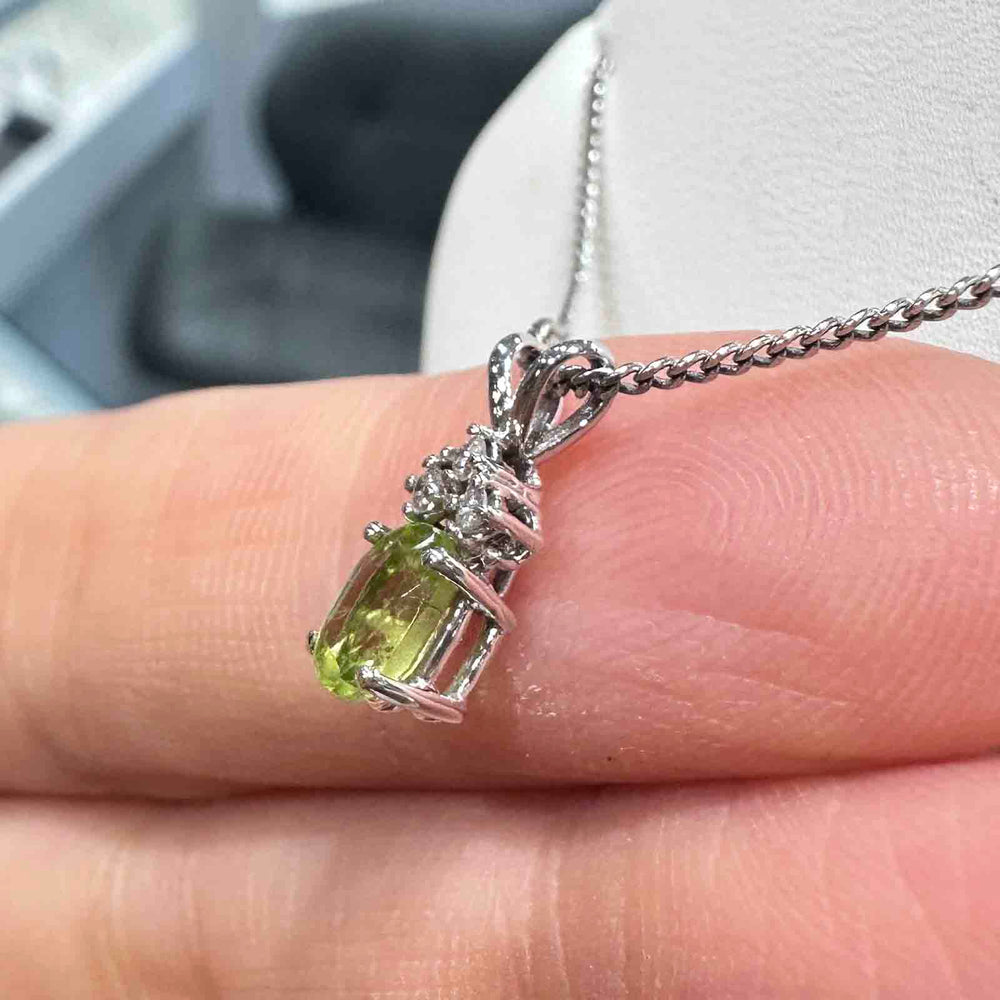 14K white gold pendant with genuine peridot and natural diamond on an 18" 14K white gold box chain, perfect for August birthstone gifts.