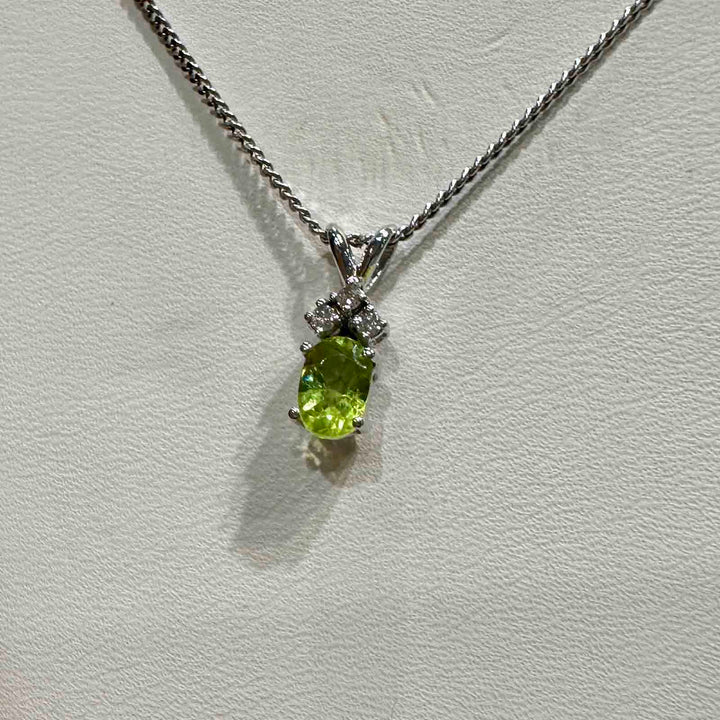 14K white gold pendant with genuine peridot and natural diamond on an 18" 14K white gold box chain, perfect for August birthstone gifts.
