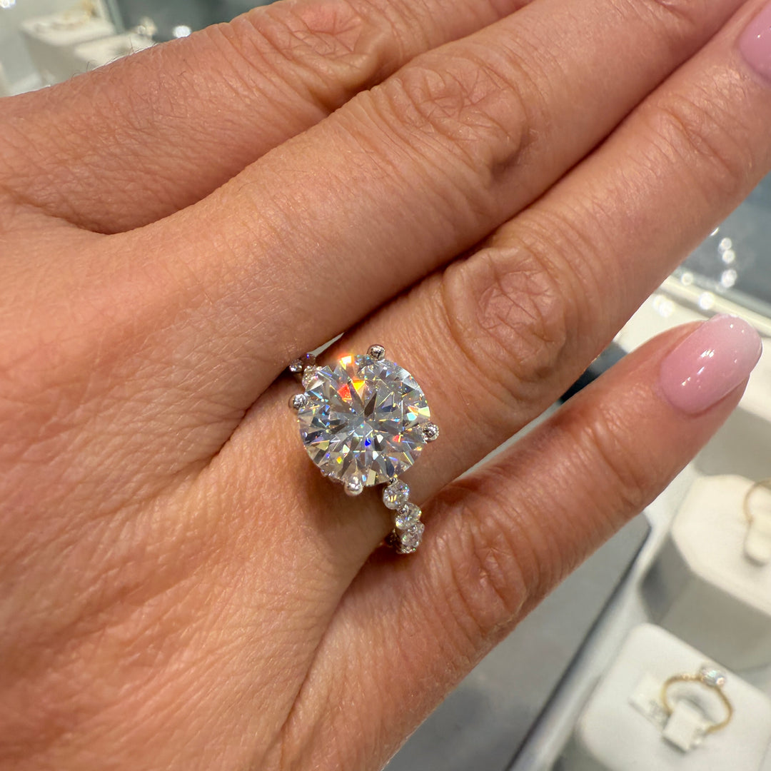 3.2 Ct round moissanite engagement ring with hidden halo in 14K gold.