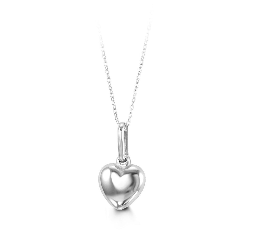 A 10K white gold necklace featuring a smooth polished heart pendant with a 14-inch chain, designed for babies and kids.