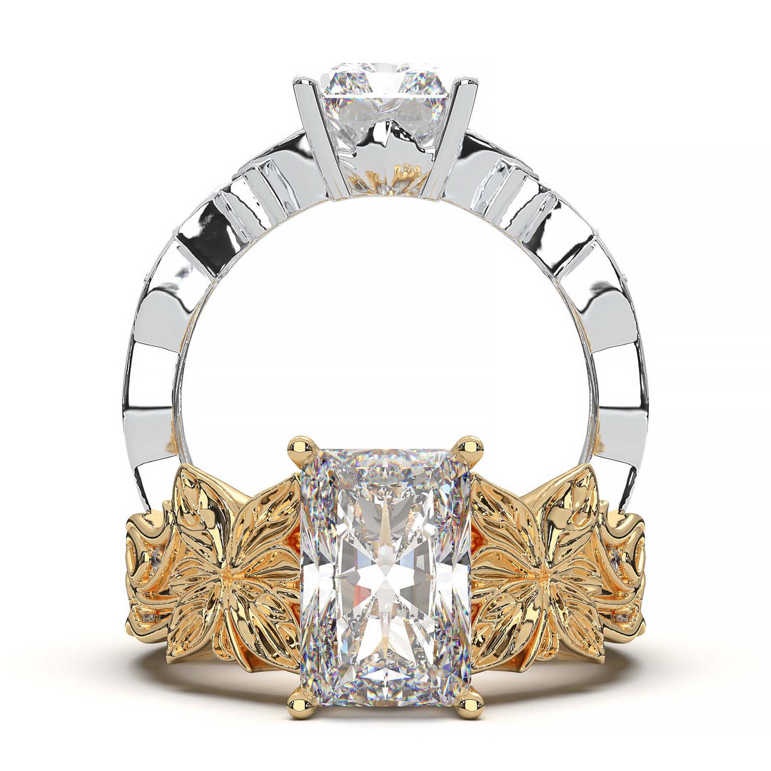 Radiant cut diamond engagement ring with floral leaf design.