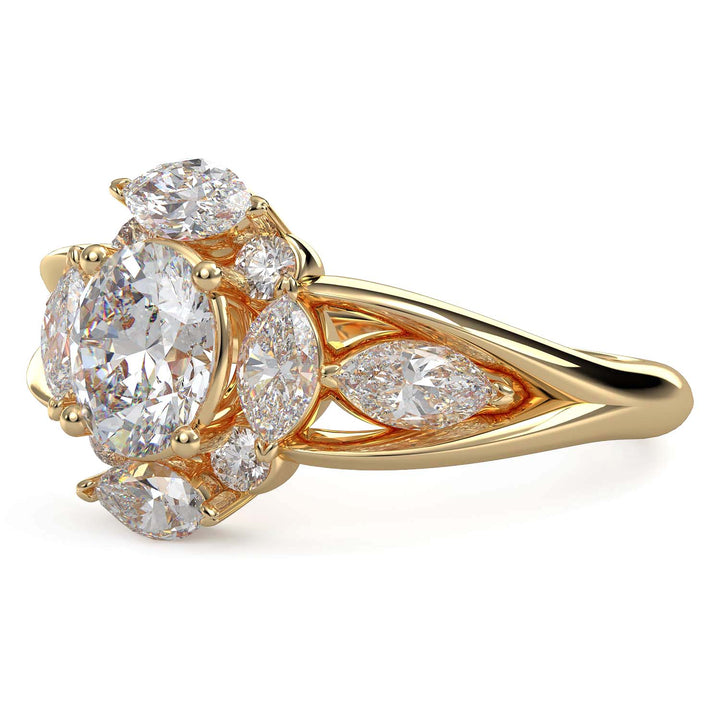 Oval lab-grown diamond ring with marquise and round halo, split shank design.