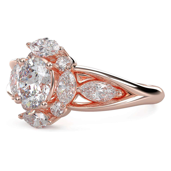 Oval lab-grown diamond ring with marquise and round halo, split shank design.