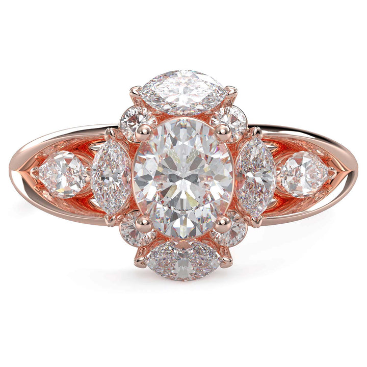 Oval lab-grown diamond ring with marquise and round halo, split shank design.