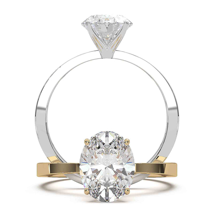 Oval diamond solitaire engagement ring with a tapered band, featuring a 1.6 CT lab-grown diamond, D color, VVS clarity.