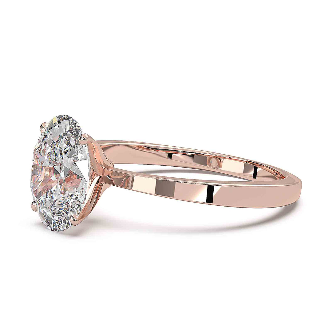 Oval diamond solitaire engagement ring with a tapered band, featuring a 1.6 CT lab-grown diamond, D color, VVS clarity.
