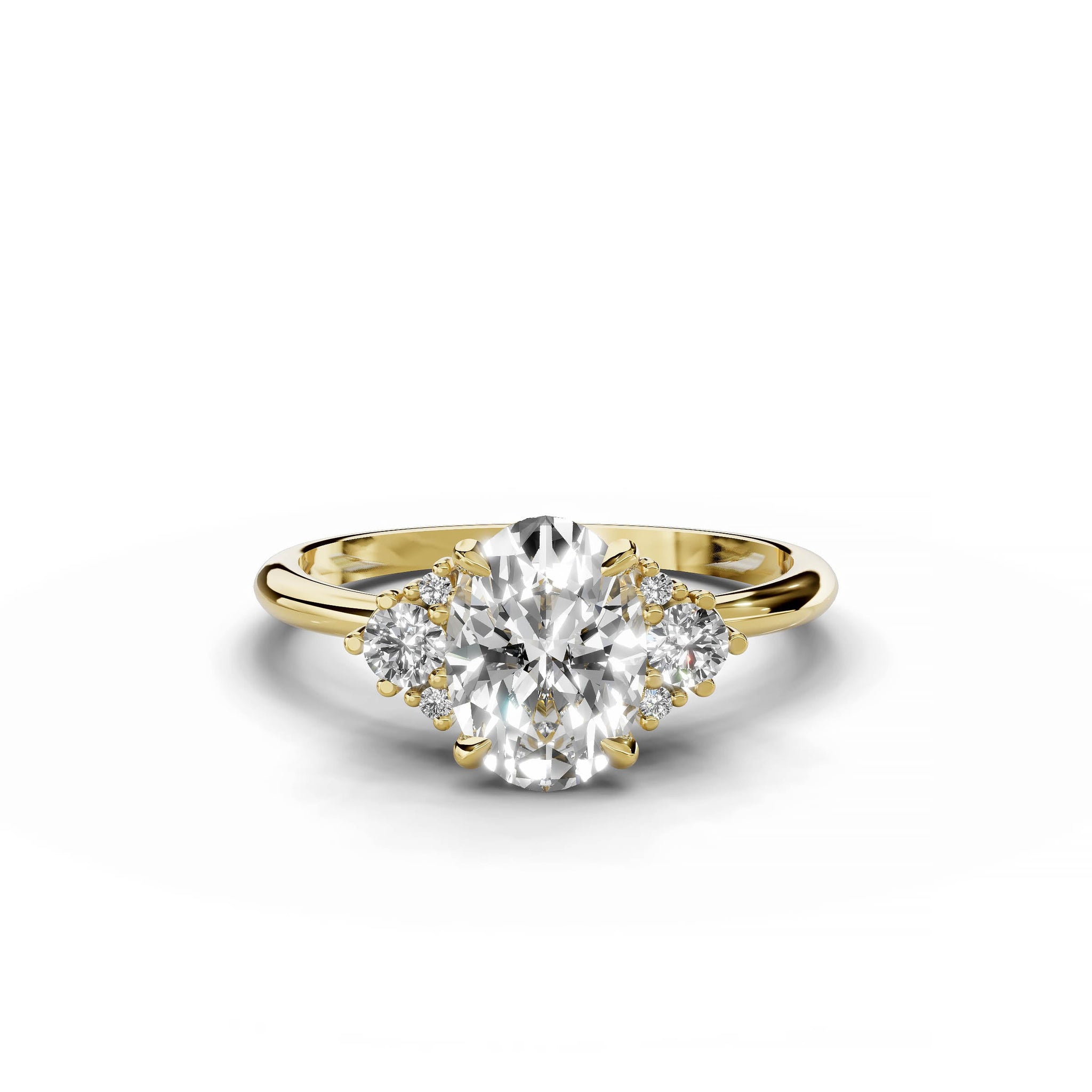 Oval diamond cluster engagement ring in yellow gold.