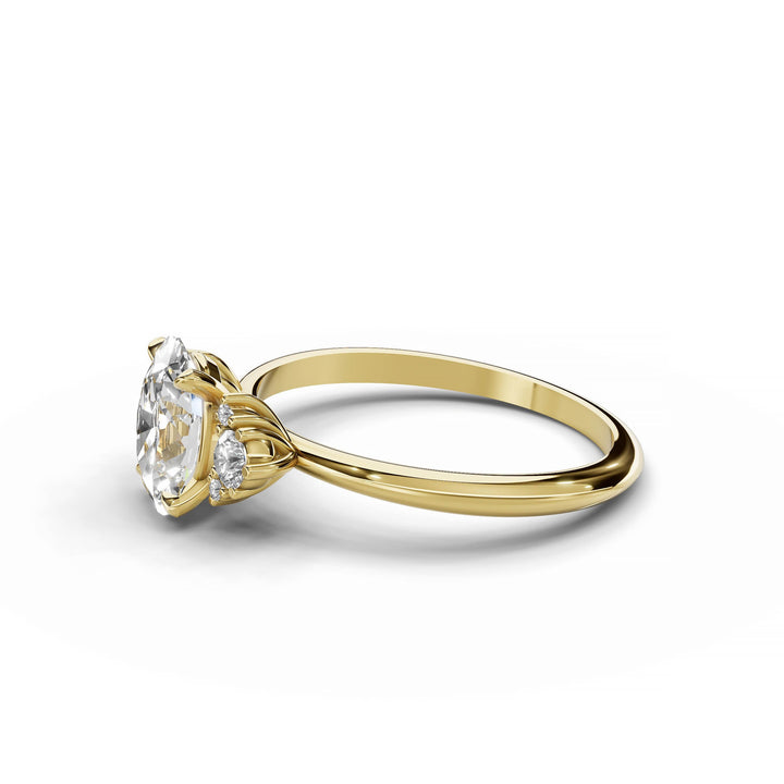 Oval diamond cluster engagement ring in yellow gold.