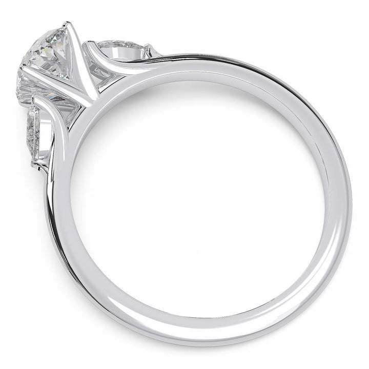 engagement ring featuring a 1 carat oval lab-grown diamond with pear-shaped side stones, held by unique cathedral-inspired prongs