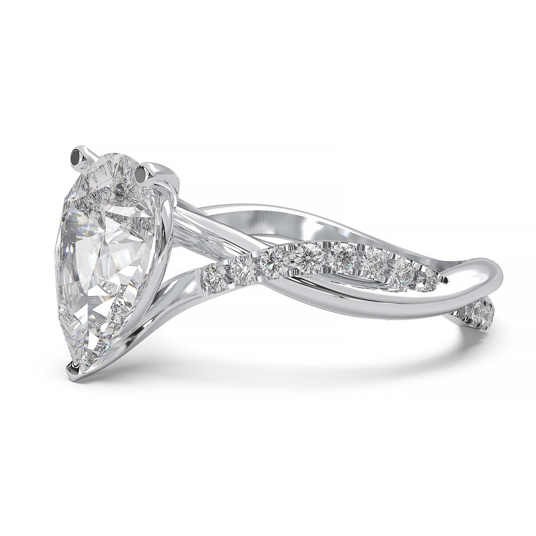 Moissanite pear-shaped engagement ring with 1.20CT center stone, accent moissanite, set in 14K gold.