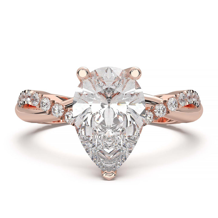 Moissanite pear-shaped engagement ring with 1.20CT center stone, accent moissanite, set in 14K gold.