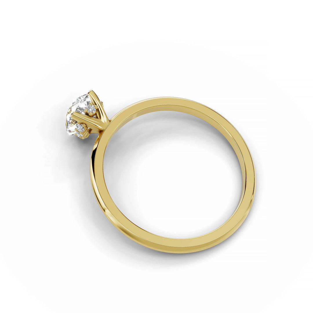 Pear-shaped diamond engagement ring, hidden halo, custom design, yellow gold.