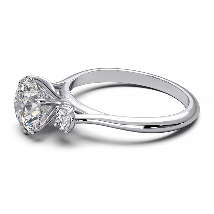 Elegant Three-Stone Engagement Ring with 1.5 Carat Center Stone