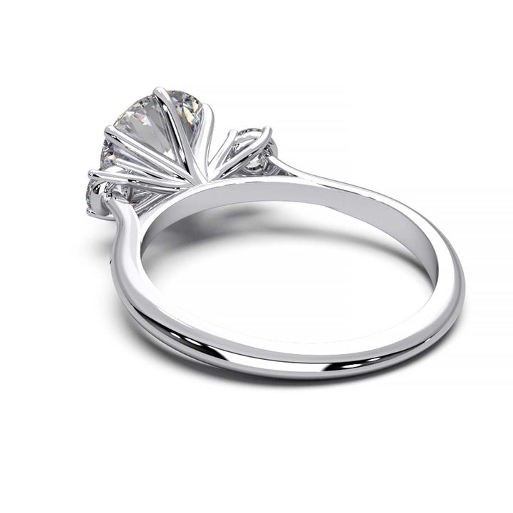 Elegant Three-Stone Engagement Ring with 1.5 Carat Center Stone