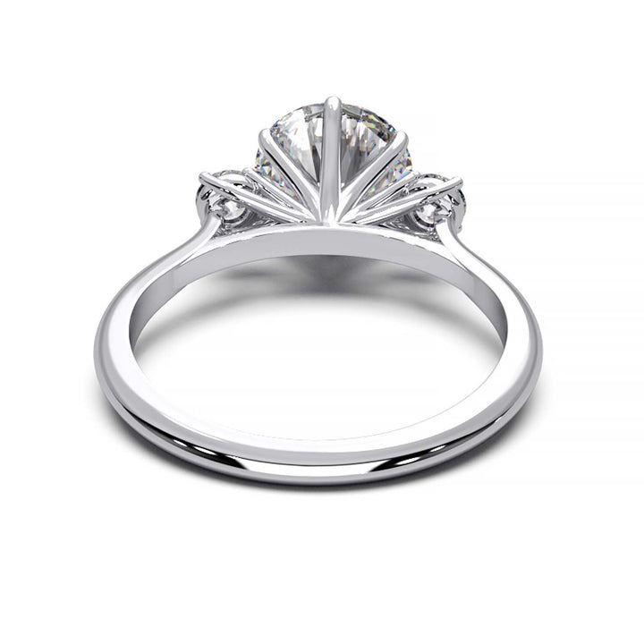 Elegant Three-Stone Engagement Ring with 1.5 Carat Center Stone
