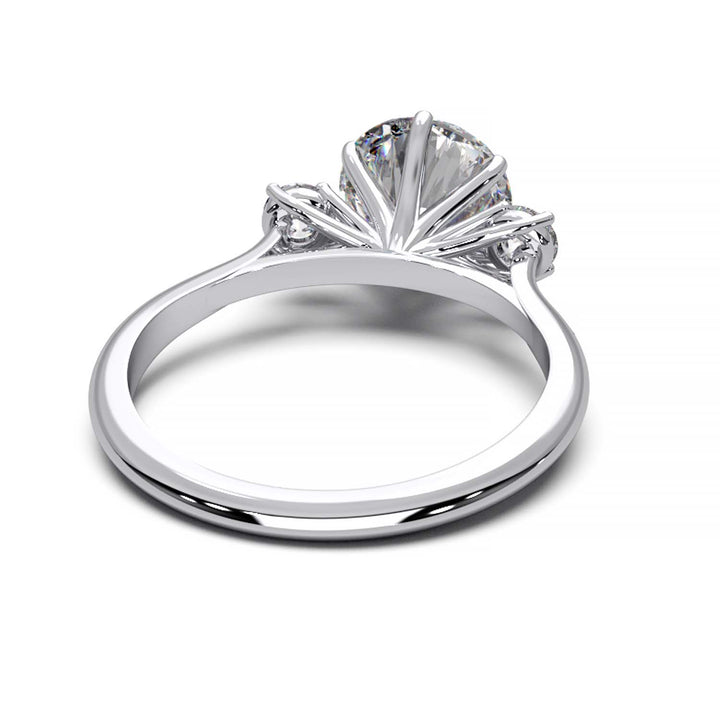 Elegant Three-Stone Engagement Ring with 1.5 Carat Center Stone