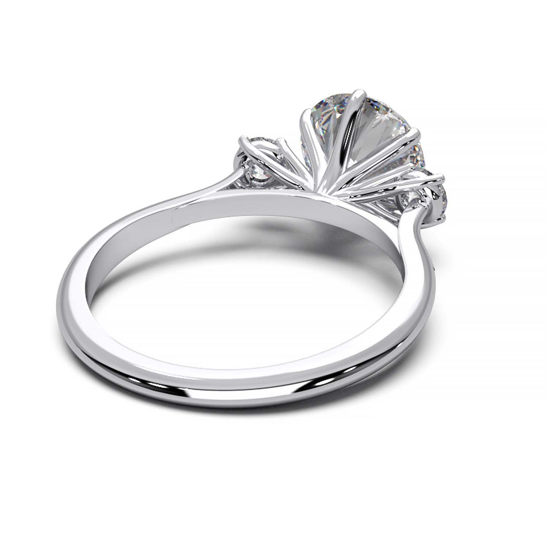 Elegant Three-Stone Engagement Ring with 1.5 Carat Center Stone