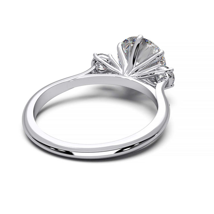 Elegant Three-Stone Engagement Ring with 1.5 Carat Center Stone
