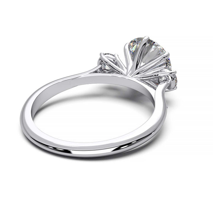 Elegant Three-Stone Engagement Ring with 1.5 Carat Center Stone