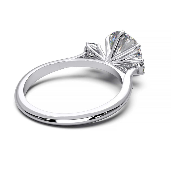 Elegant Three-Stone Engagement Ring with 1.5 Carat Center Stone