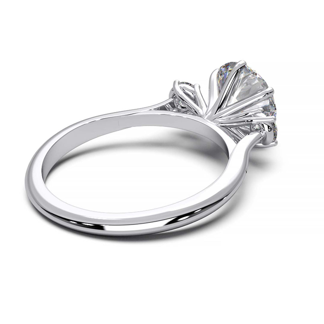 Elegant Three-Stone Engagement Ring with 1.5 Carat Center Stone