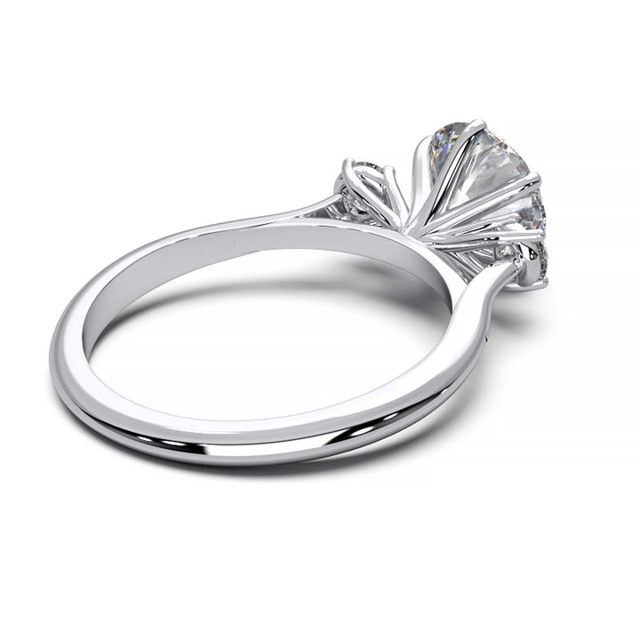 Elegant Three-Stone Engagement Ring with 1.5 Carat Center Stone