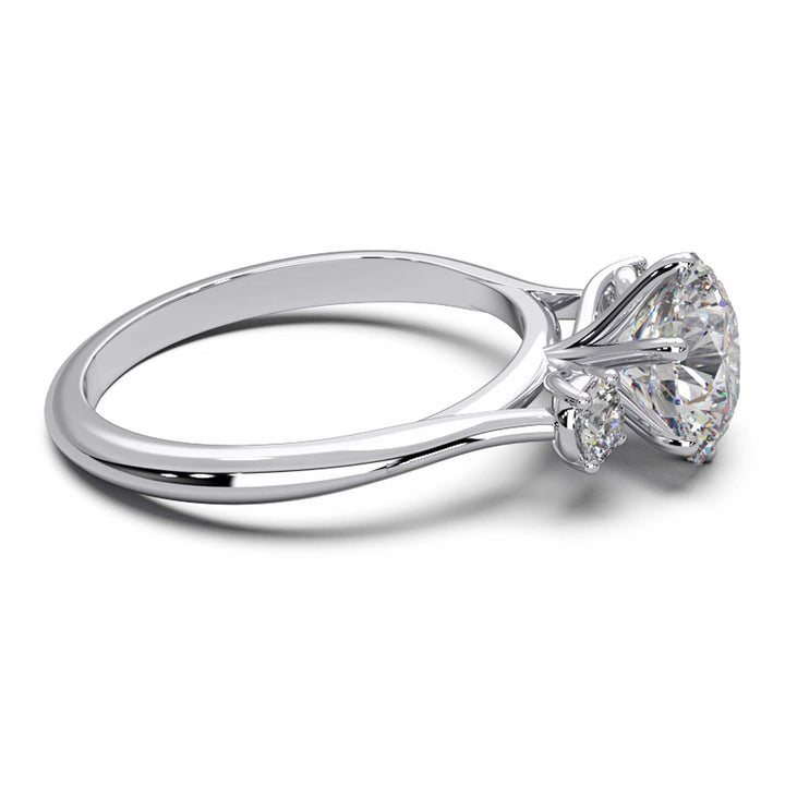 Elegant Three-Stone Engagement Ring with 1.5 Carat Center Stone