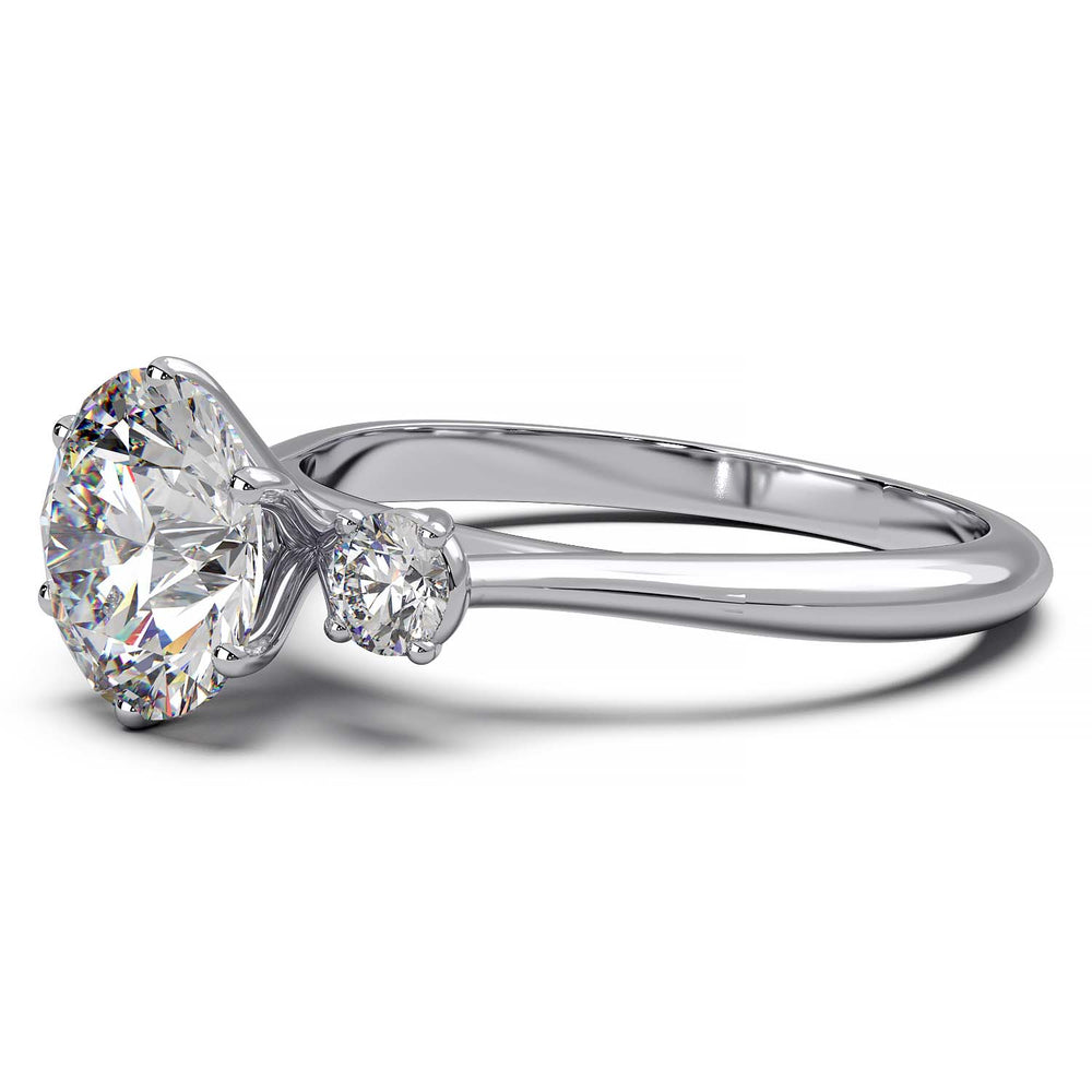 Elegant Three-Stone Engagement Ring with 1.5 Carat Center Stone