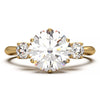 Elegant Three-Stone Engagement Ring with 1.5 Carat Center Stone