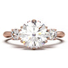Elegant Three-Stone Engagement Ring with 1.5 Carat Center Stone
