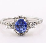 Stunning 14K Gold Oval Blue Sapphire Ring with Halo and Side Stones