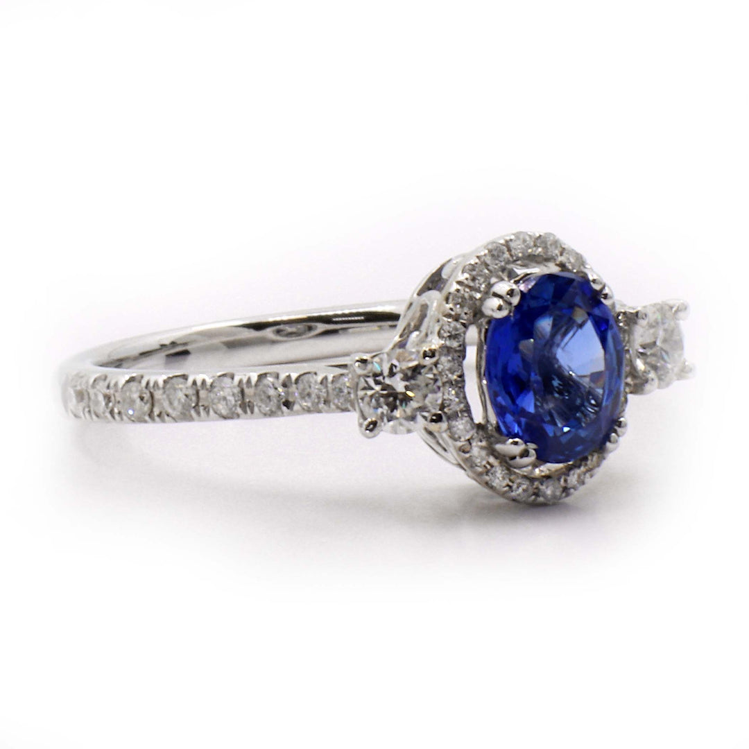 Stunning 14K Gold Oval Blue Sapphire Ring with Halo and Side Stones