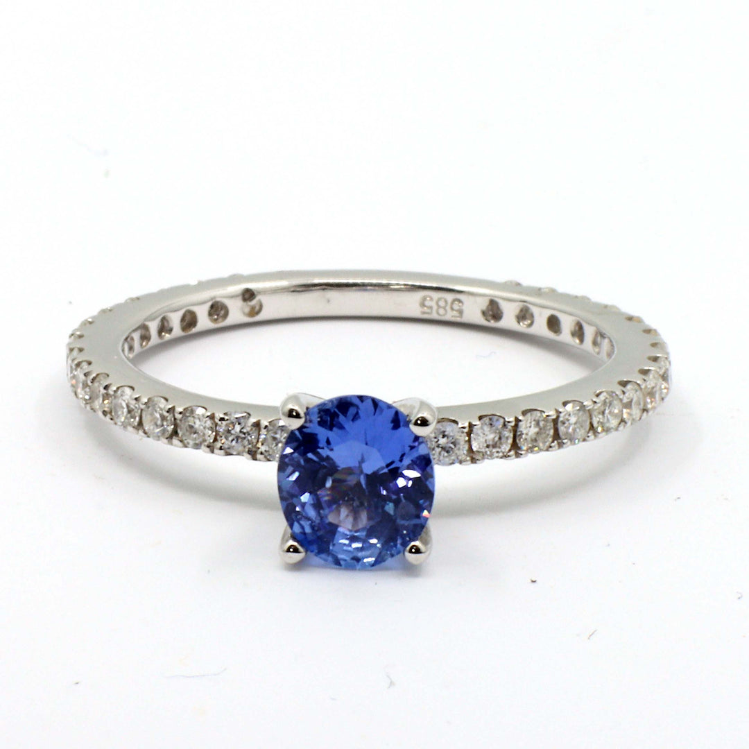 Chic Oval Blue Sapphire 0.74 CT Ring with Diamond Accents in 14K Gold