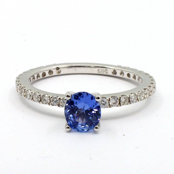 Chic Oval Blue Sapphire 0.74 CT Ring with Diamond Accents in 14K Gold