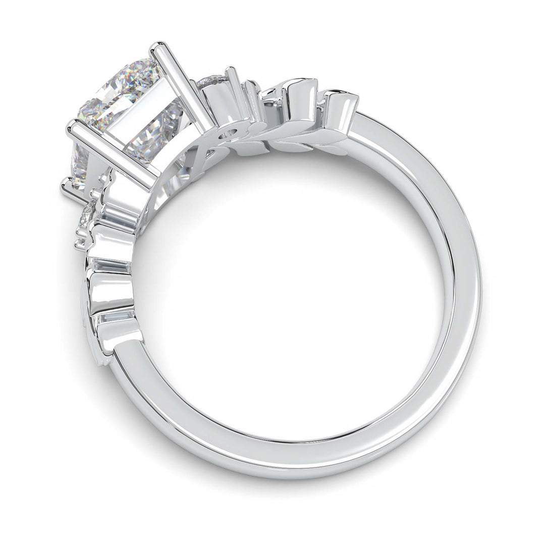 Radiant cut diamond engagement ring with leaf design.